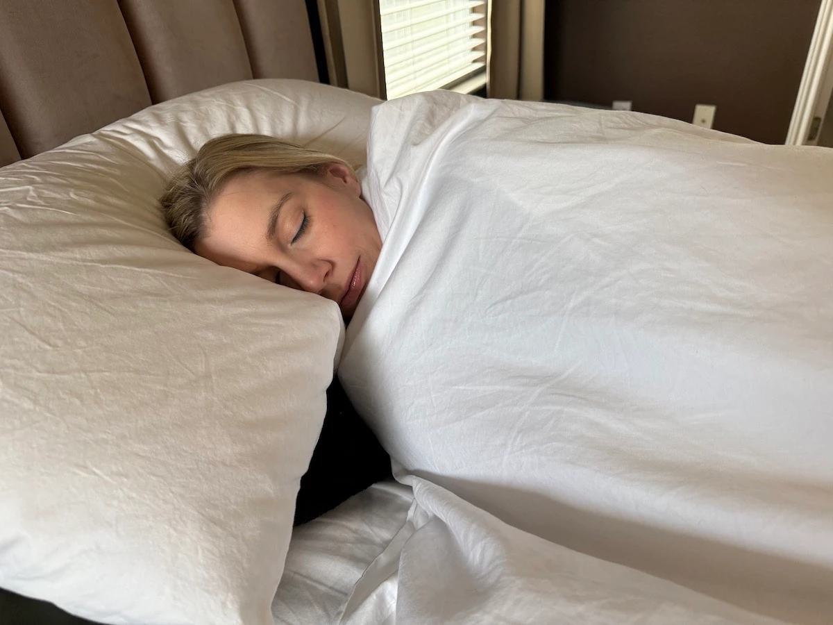 An image illustrating a woman sleeping.