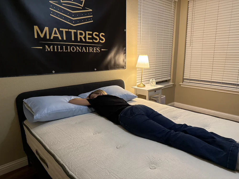 Stomach sleeper testing support on Avocado Green mattress