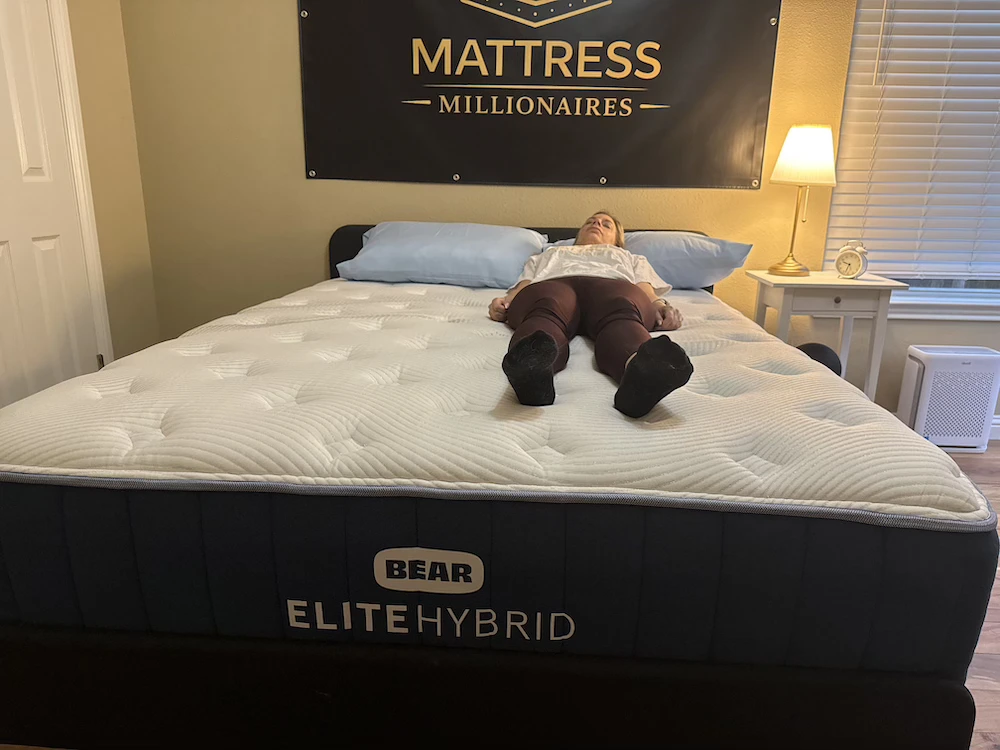Back sleeper testing the Bear Elite Hybrid during the mattress adjustment period