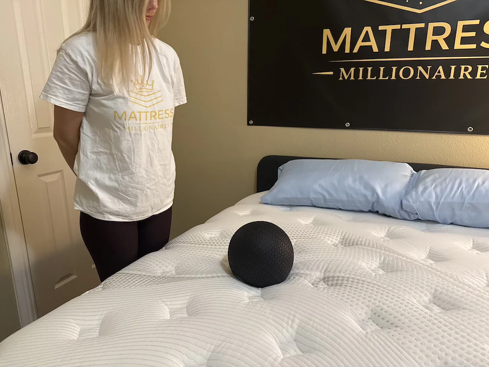 Motion isolation test on the Bear Elite Hybrid mattress using a black ball