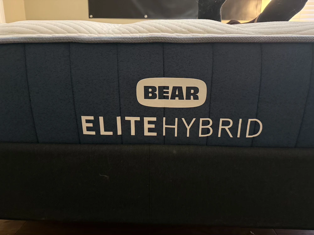 Bear Elite Hybrid mattress side panel with branded logo during Mattress Millionaires testing