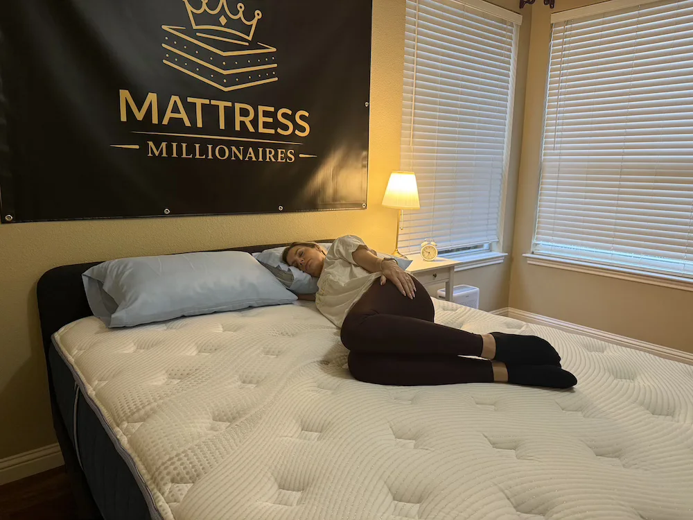 Side sleeper testing pressure relief on the Bear Elite Hybrid Medium mattress