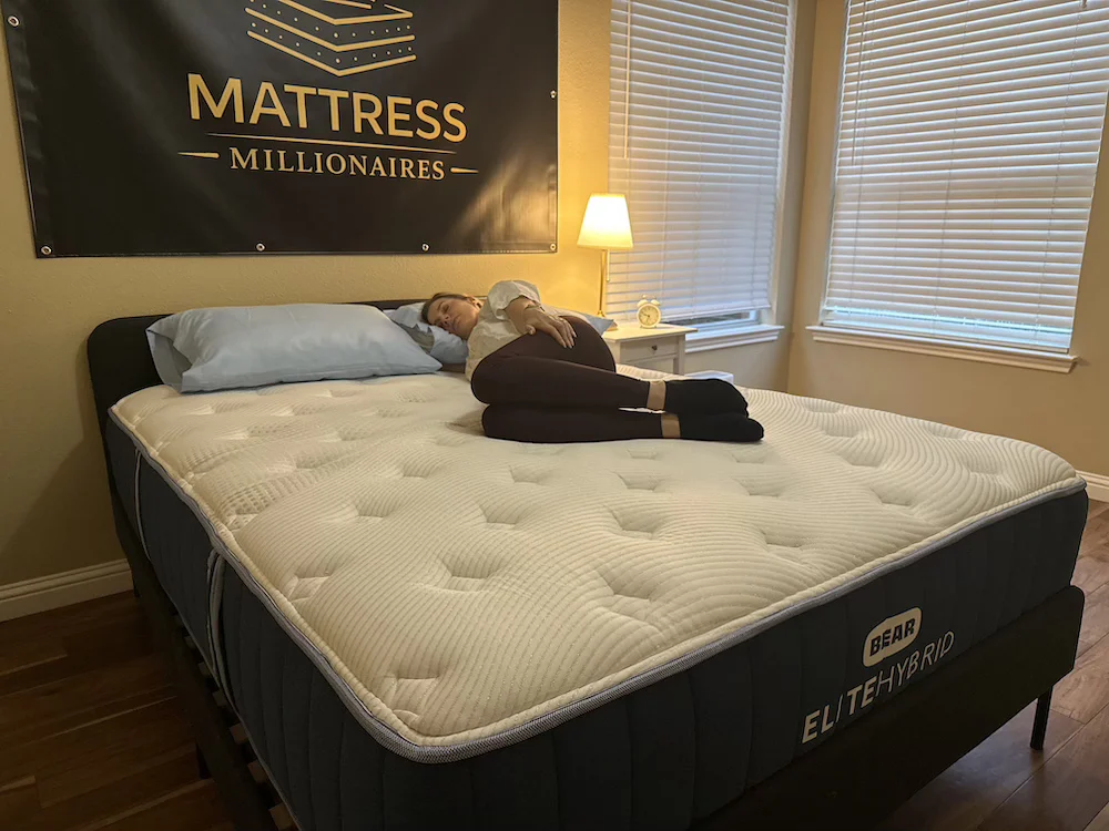 Side sleeper testing pressure relief on the Bear Elite Hybrid Medium mattress