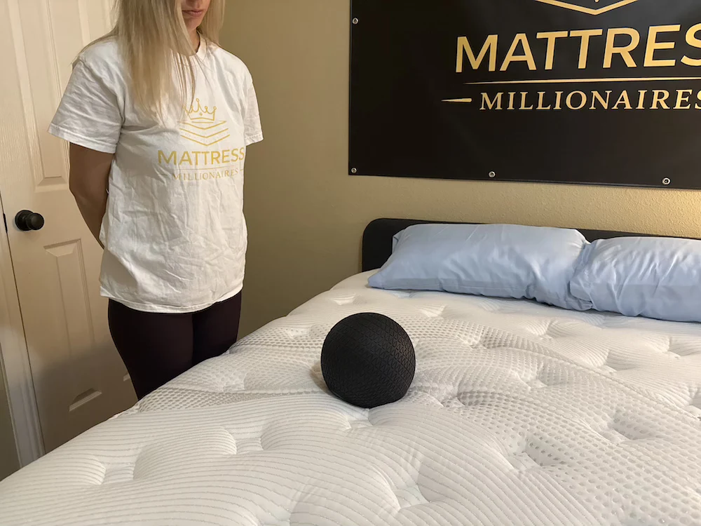 Motion isolation ball test on the Bear Elite Hybrid mattress during comparison testing