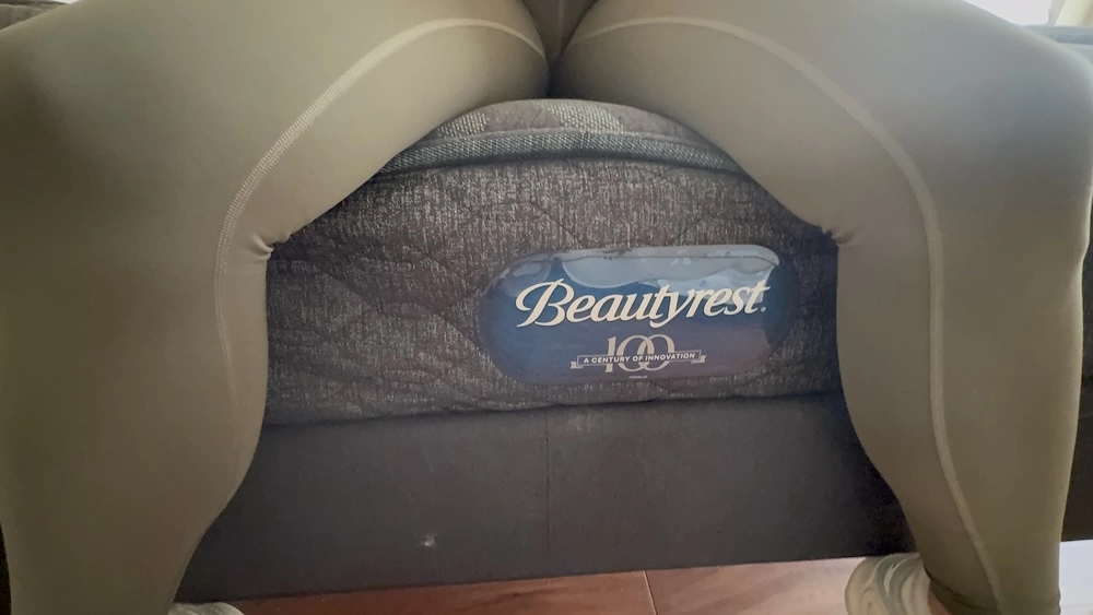 Beautyrest brand label on the side of a gray mattress