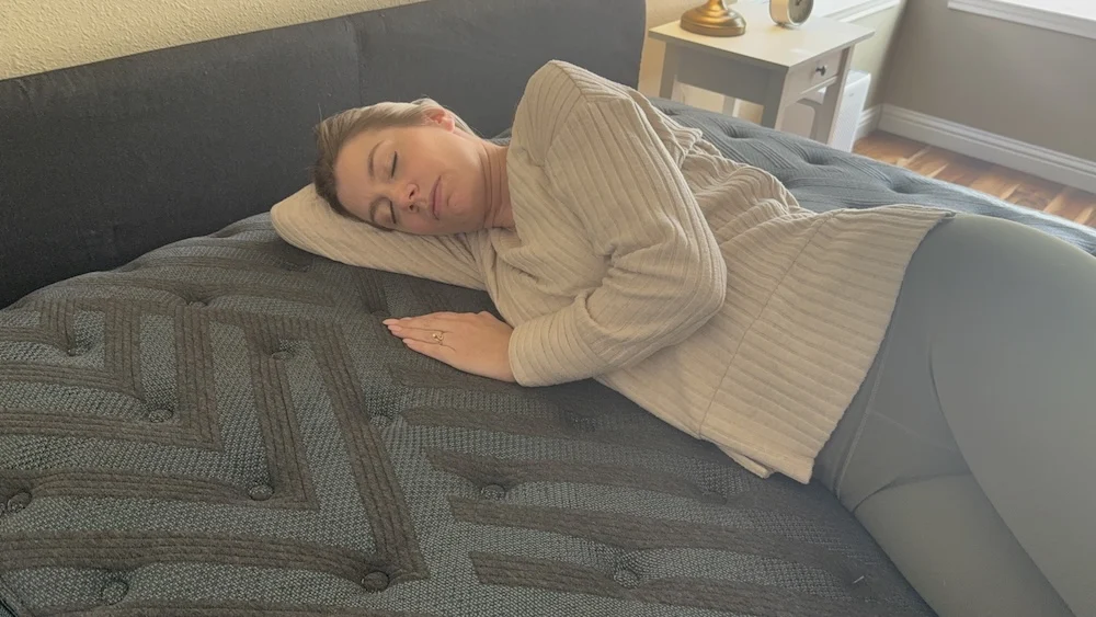 Side sleeper testing pressure relief on the Beautyrest Silver BRS900 Medium mattress