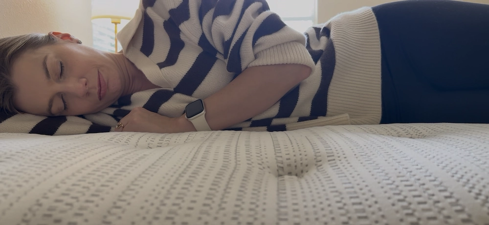 Woman side sleeping on the Beautyrest Silver BRS900 Medium mattress