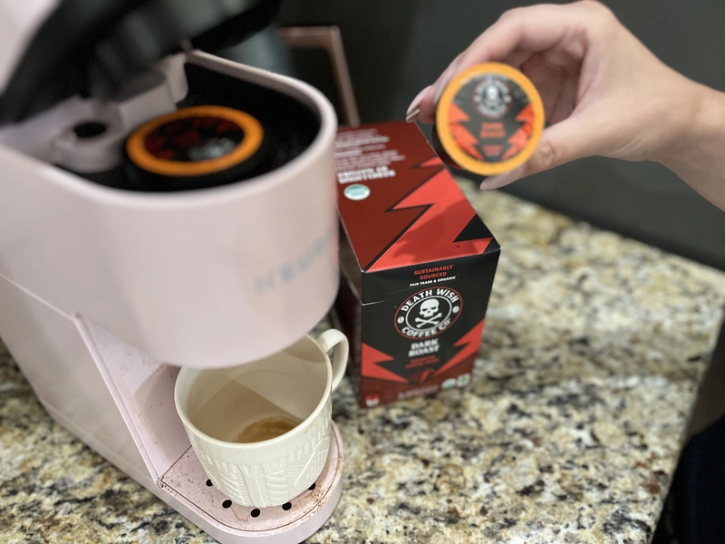 Brewing a cup of coffee, which may contribute to nighttime acid reflux when consumed late in the day.