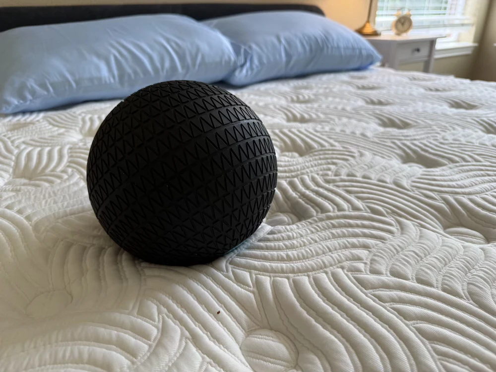 Black 10 pound ball on the DLX Premier Hybrid mattress for motion isolation testing