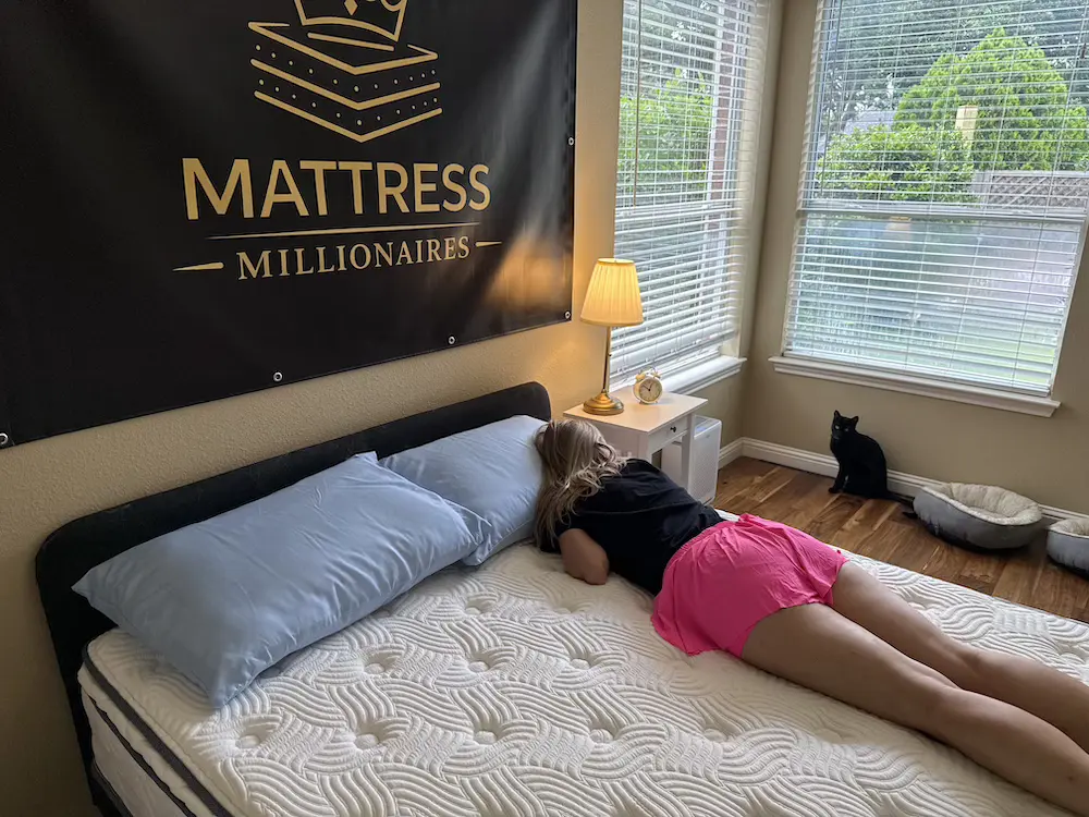 Stomach sleeper testing the DLX Premier Hybrid mattress for support