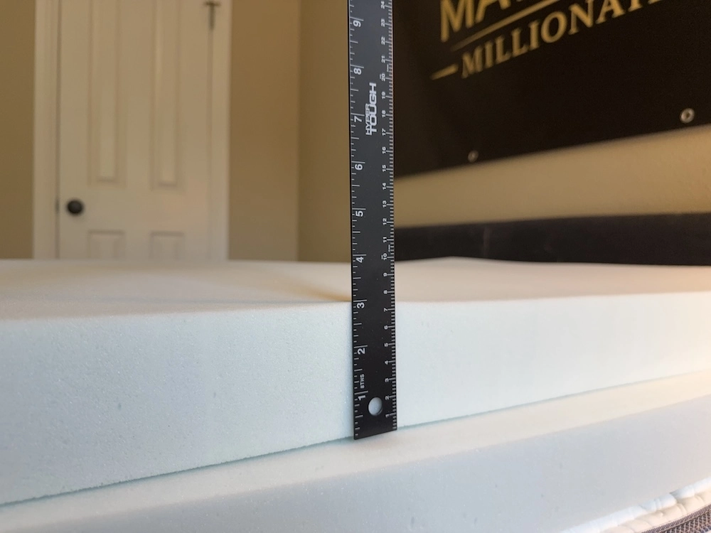 Measuring the 3 inch DLX Premier Hybrid foam insert with a ruler