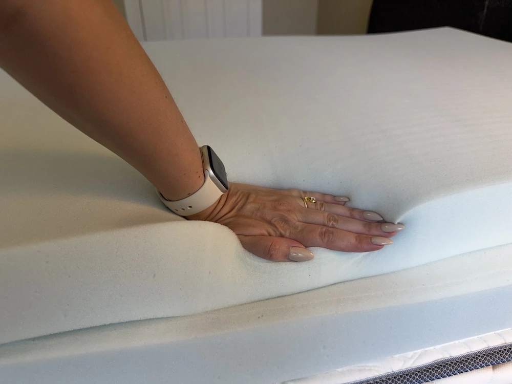 Hand pressing the DLX Premier removable foam layer