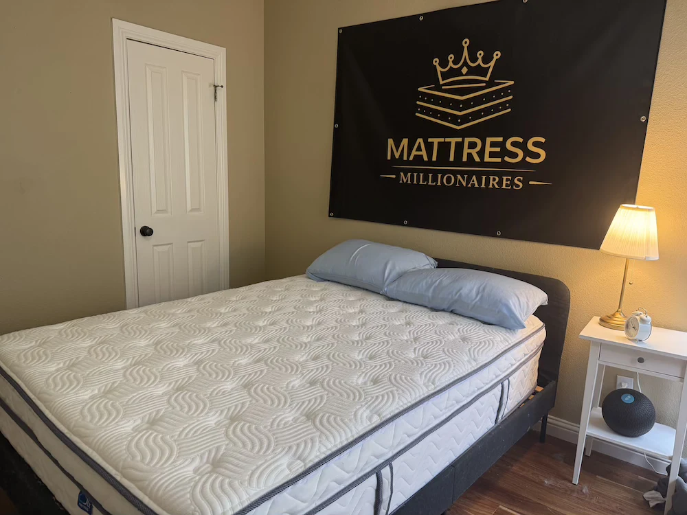 DLX Premier Hybrid and Layla Hybrid mattress comparison in Mattress Millionaires testing room