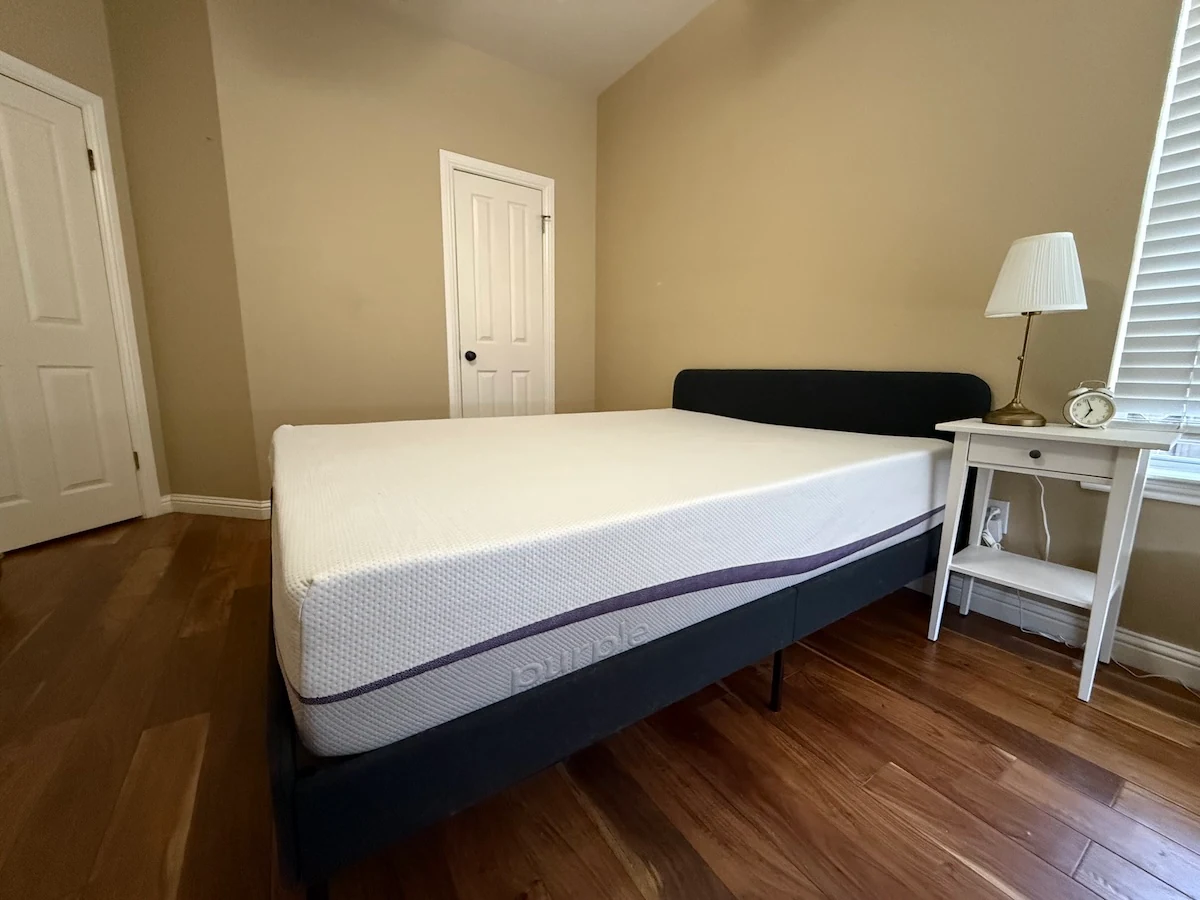 An image of the PurplePlus mattress, in a room
