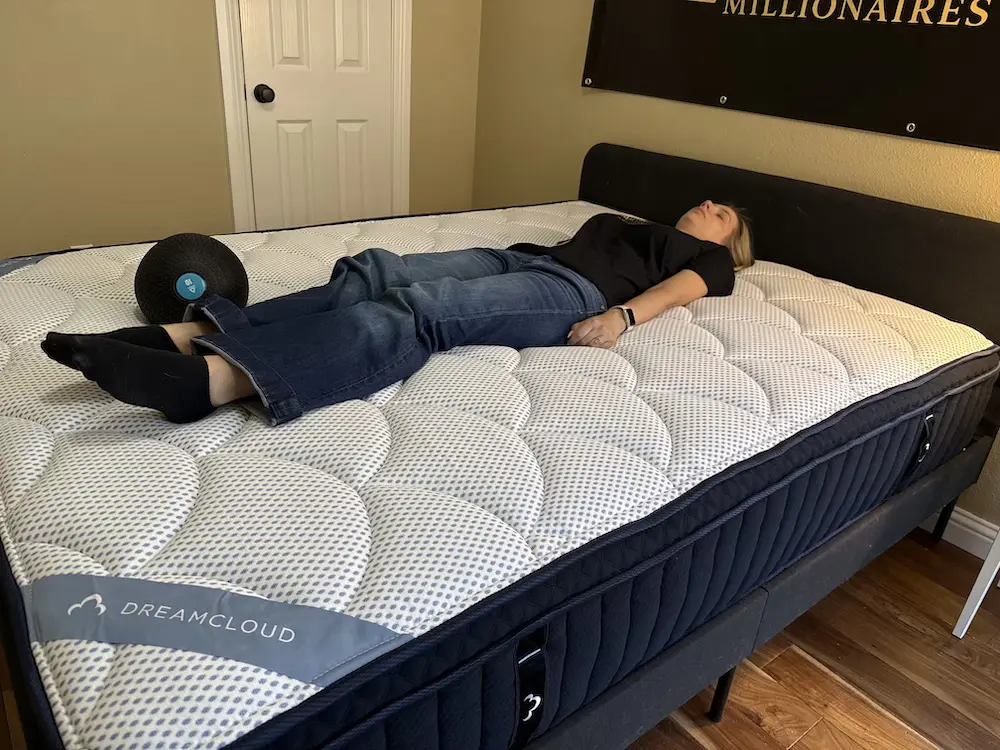 Back sleeper testing support on the DreamCloud Premier Hybrid mattress
