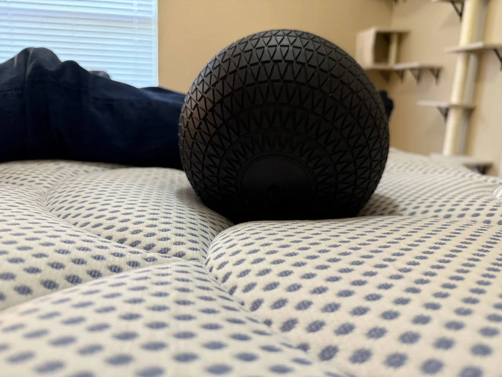 Ball test on DreamCloud Premier mattress showing slight motion transfer