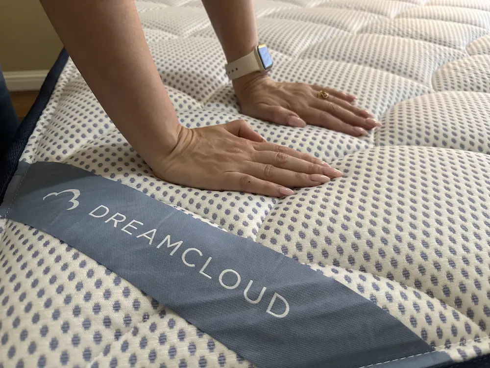 Close-up of DreamCloud Premier pillow top showing pressure relief and cushioning