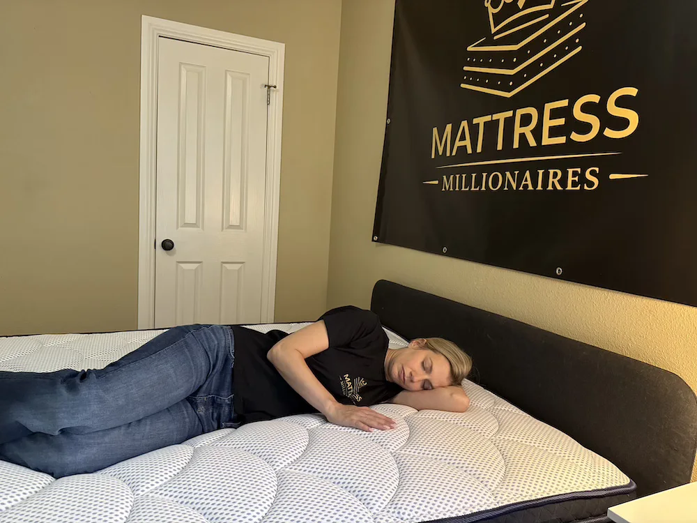 Side sleeper testing pressure relief on the DreamCloud Premier Hybrid mattress