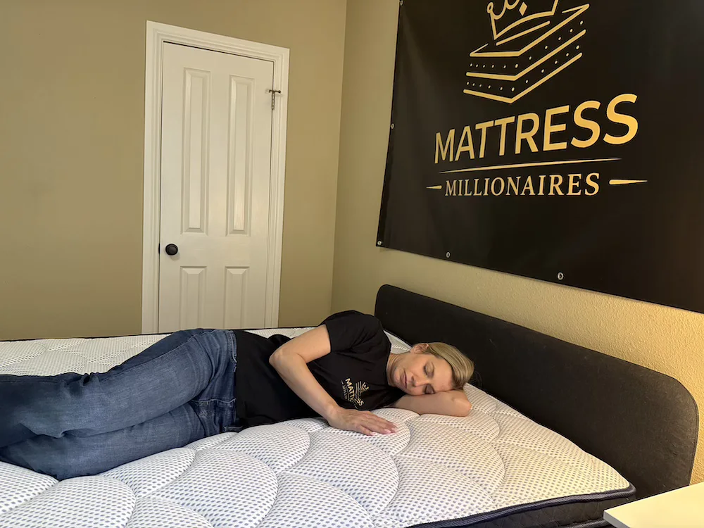 Side sleeper testing the DreamCloud Premier hybrid mattress