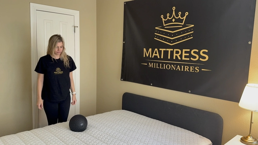 Black ball on Helix Midnight mattress before motion isolation drop test