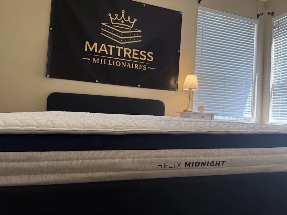 Helix Midnight mattress side profile in Mattress Millionaires sleep lab