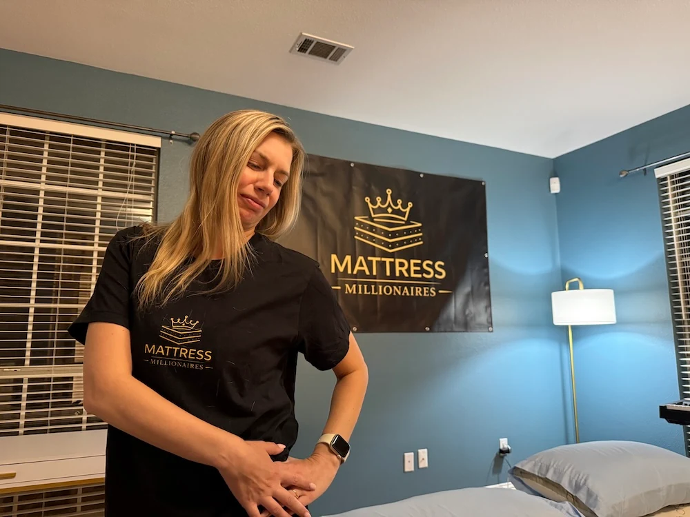 Image of a woman wincing in pain, from hip pain