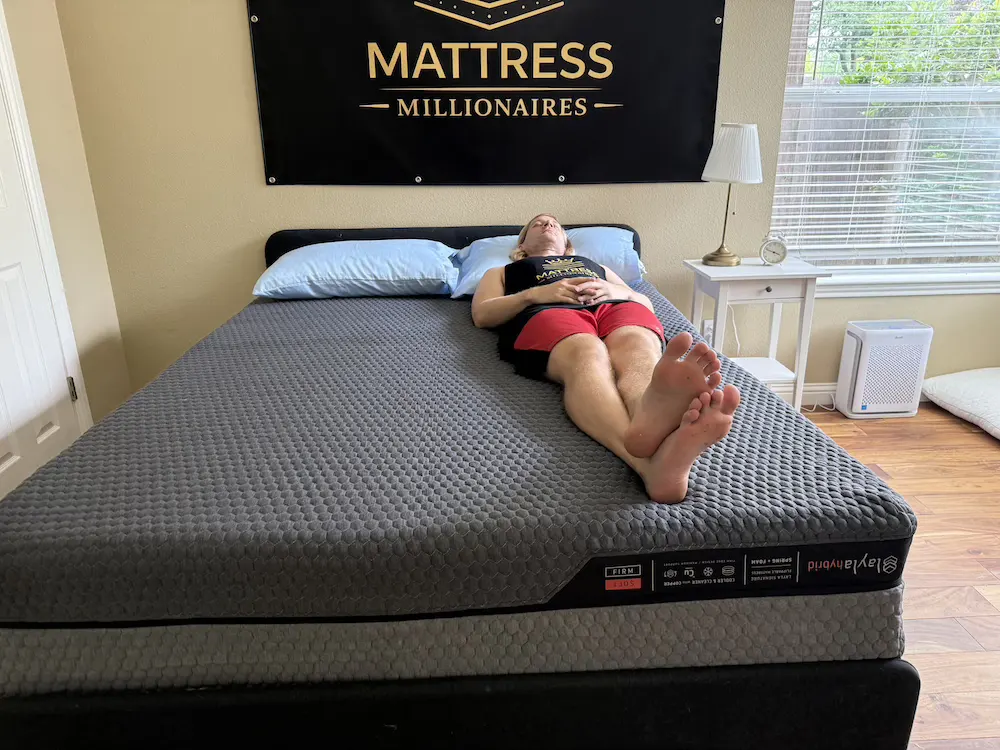 Back sleeper testing the Layla Hybrid Flippable mattress