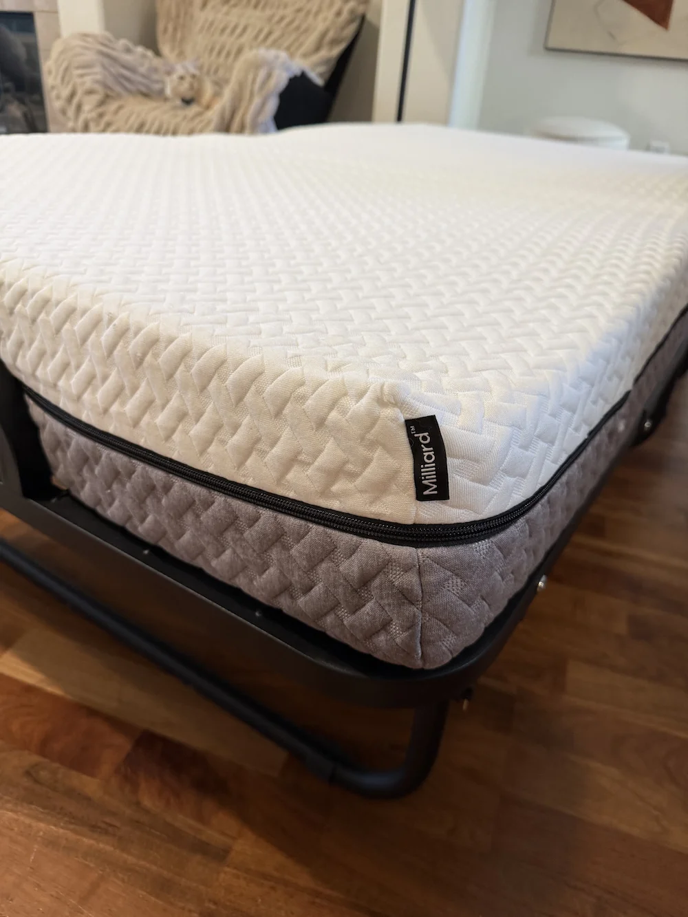 Close-up of mattress corner showing edge support and material structure