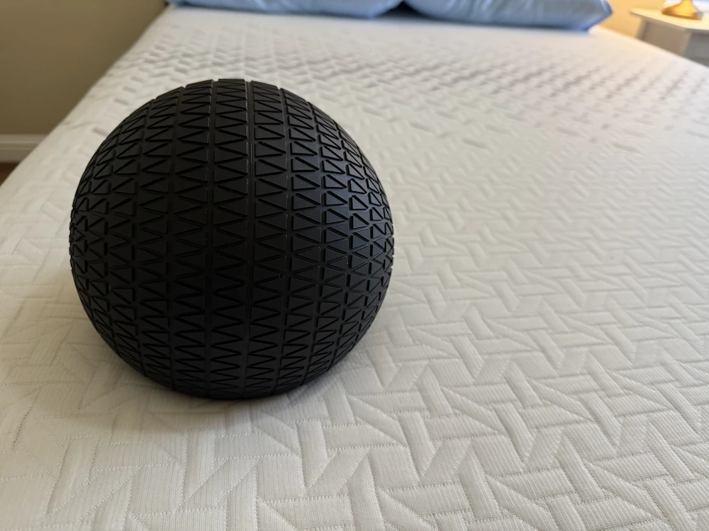 Weighted ball test on Nectar Premier mattress showing motion isolation performance