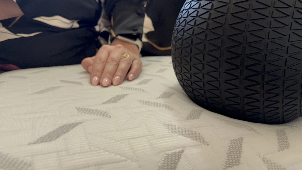 Nectar Premier pressure relief test with weighted ball and hand compression