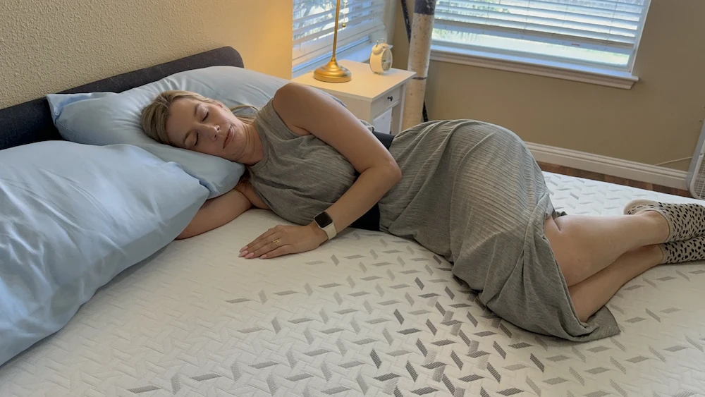 Side sleeping on Nectar Premier mattress showing pressure relief in hips and shoulders