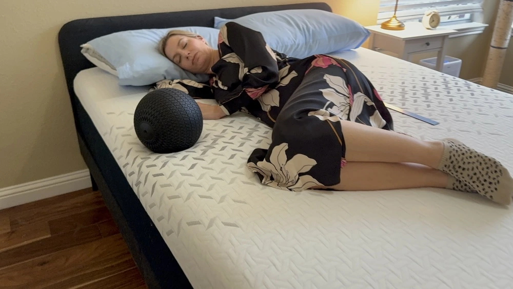 Side sleeping on Nectar Premier memory foam mattress showing deep contouring and pressure relief