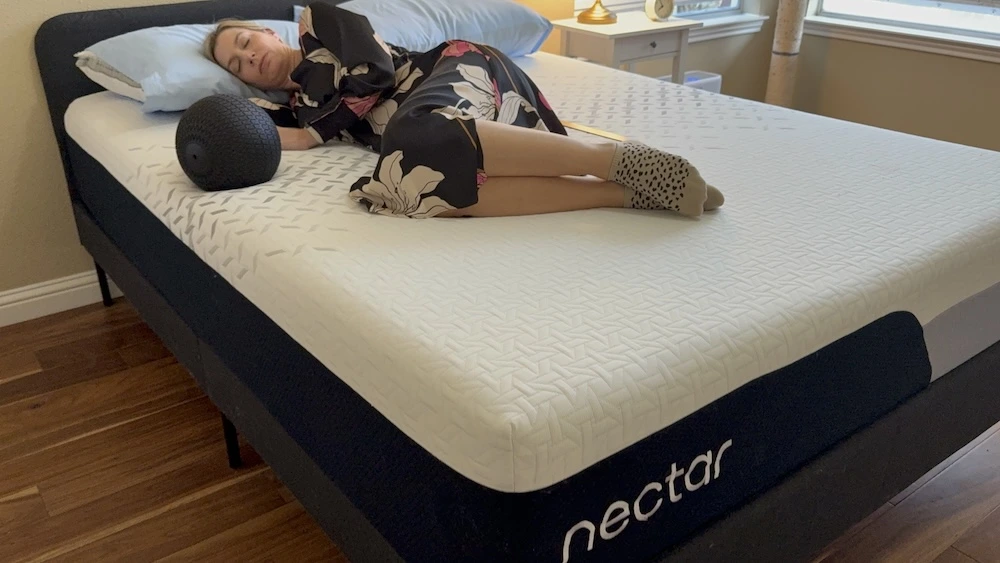 Side sleeping on the Nectar Premier mattress showing body contouring and pressure relief