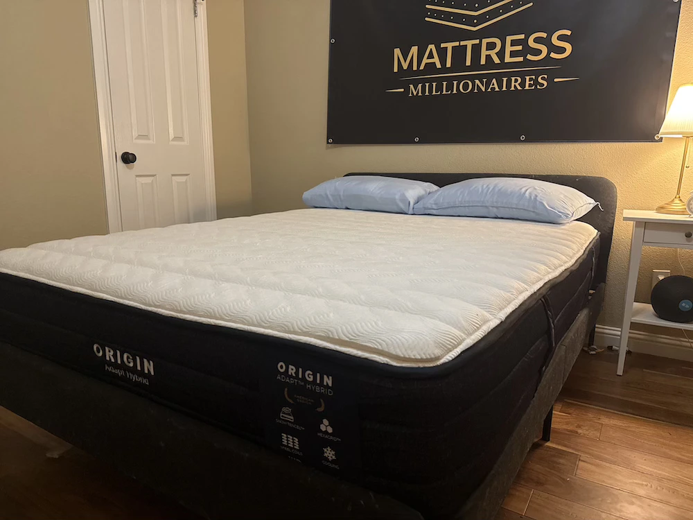 Origin Adapt Hybrid mattress fully expanded in the Mattress Millionaires testing room