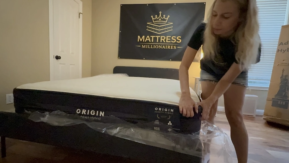 Tester cutting plastic from the Origin Adapt Hybrid during unboxing
