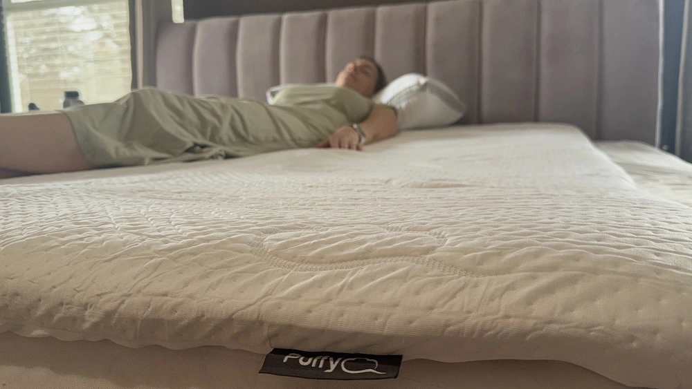 Back sleeping test on the Puffy Deluxe Mattress Topper