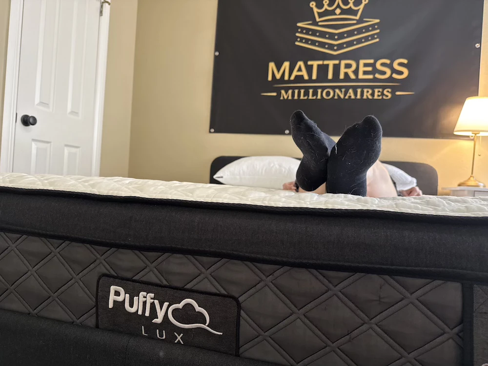 Back sleeper testing the Puffy Lux Hybrid mattress