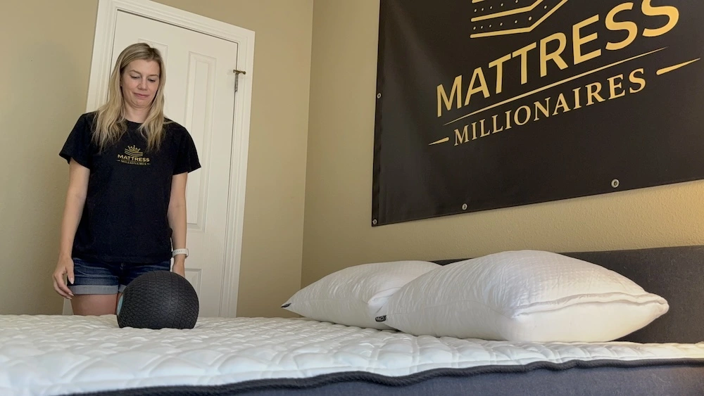 Puffy Lux Hybrid motion isolation test with weighted ball