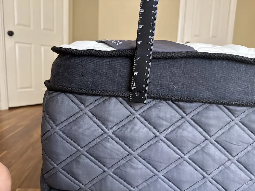 Puffy Lux Hybrid mattress height measured with ruler showing 11.5 inches
