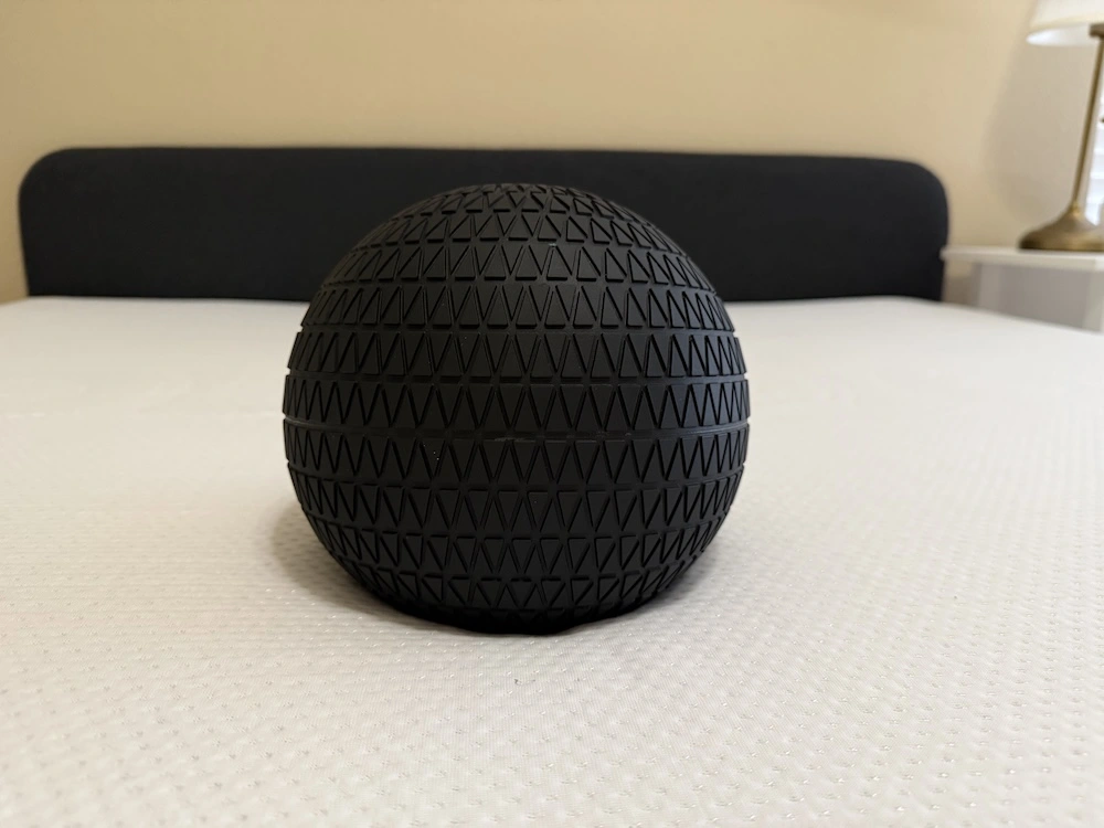 Ball test on Purple Plus mattress showing adaptive GelFlex Grid response