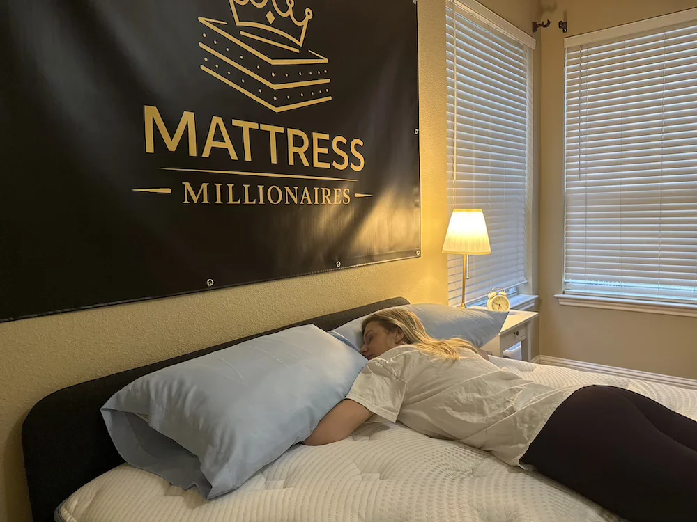 Side sleeper testing pressure relief on the Bear Elite Hybrid mattress