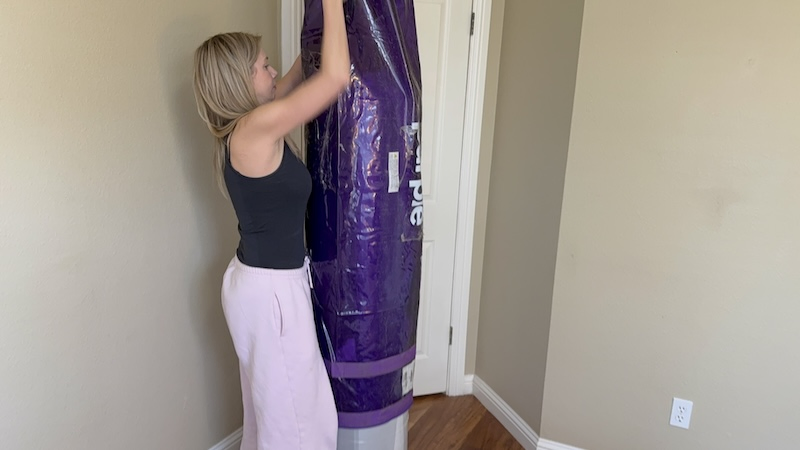 Unboxing a Purple mattress during testing
